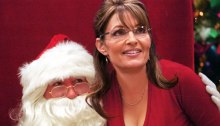 Sarah Palin looking awkward on Santa's lap